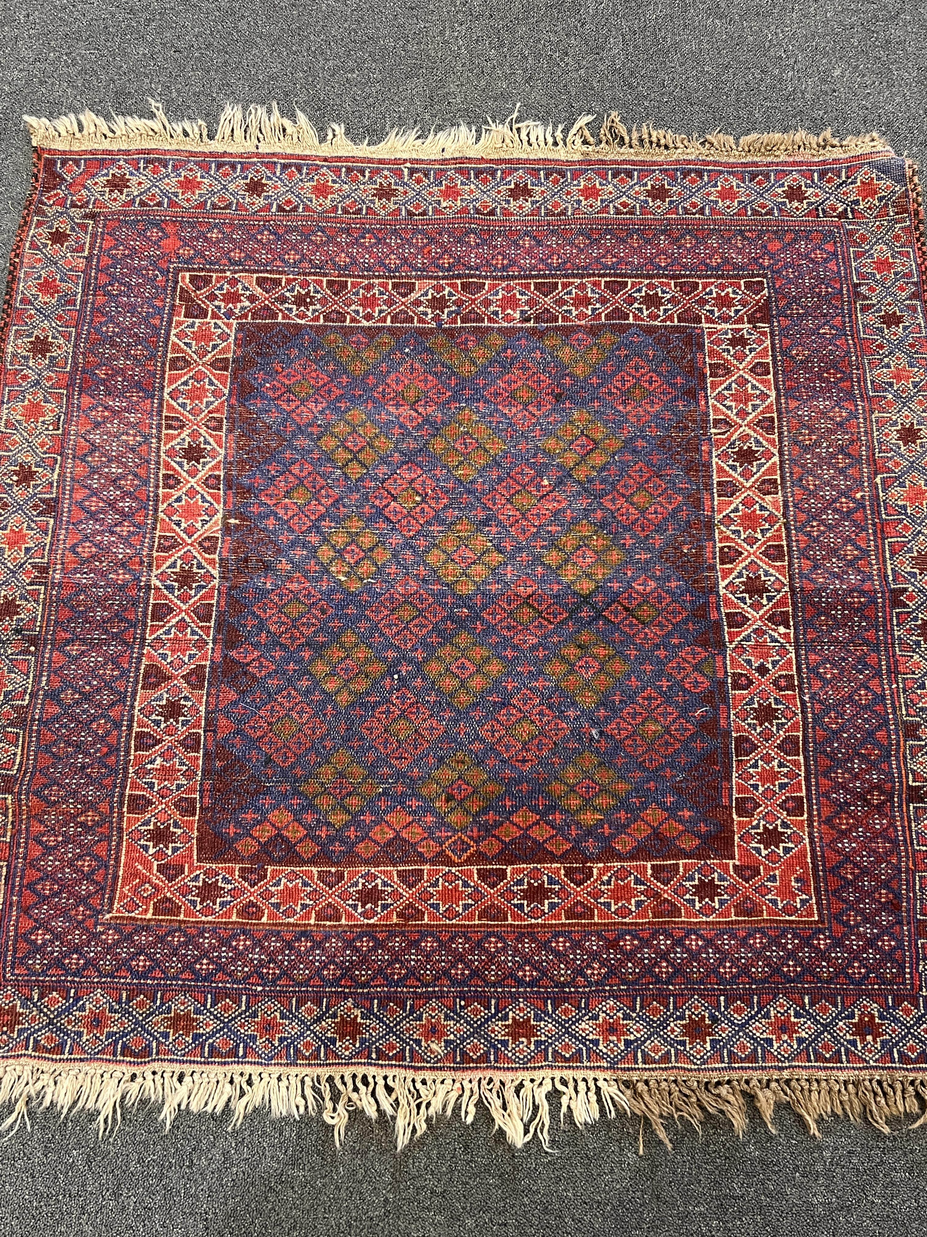 Two Afghan rugs / saddlebags, larger 104 x 108cm. Condition - fair